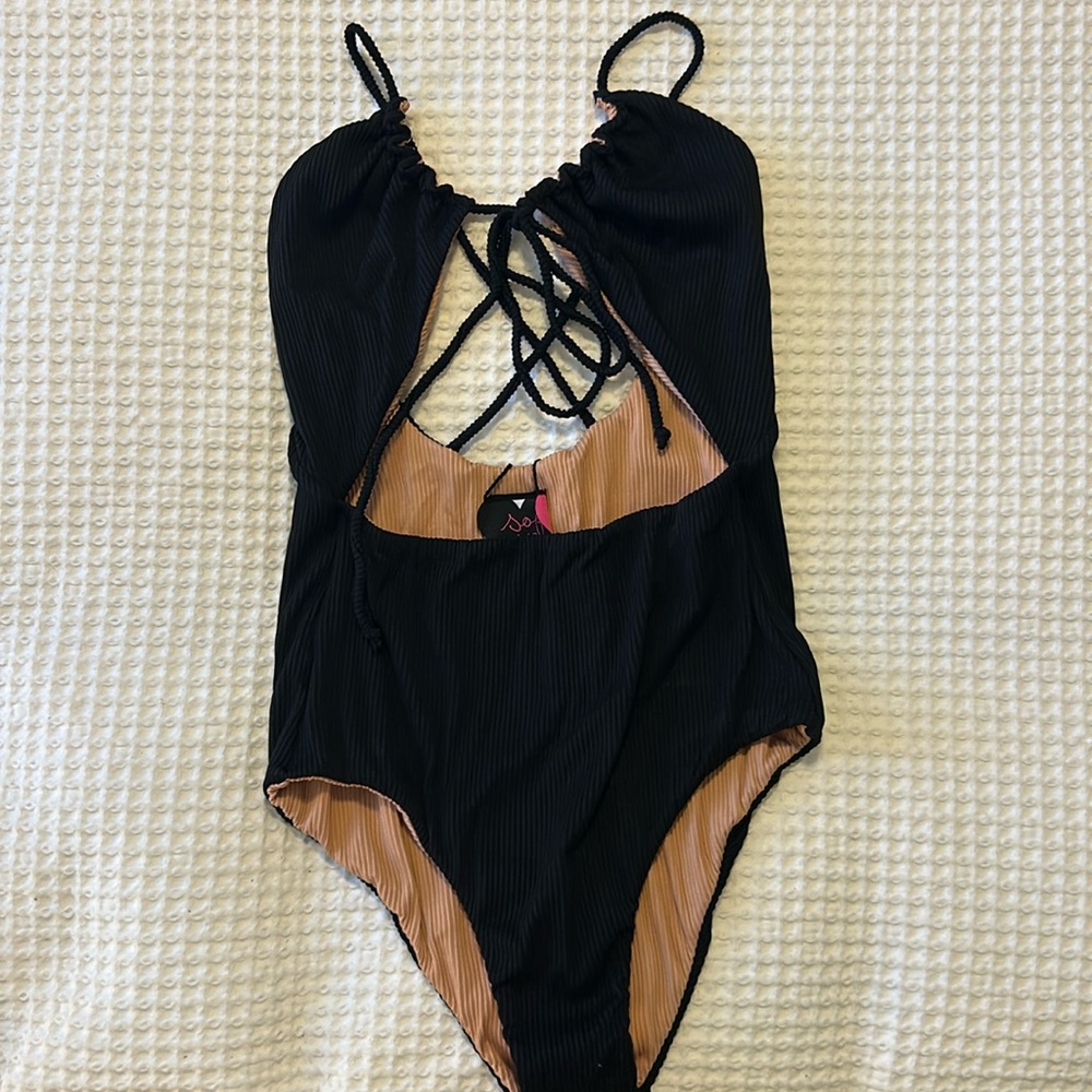 Reversible black & tan one piece